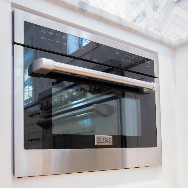 ZLINE 24" Built-in Convection Microwave Oven placed in a marble tabletob